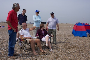 His Highness King Mike (Canute) Finch holding court on Dunwich beach with loyal(?) subjects Guy Gomes, Eric, Marion Browning, Tracy Finch and Paul Browing.